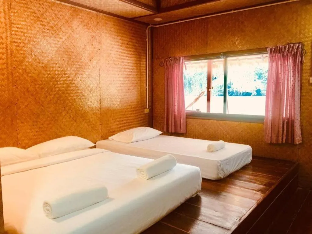 Bed in Tayan Resort Kanchanaburi