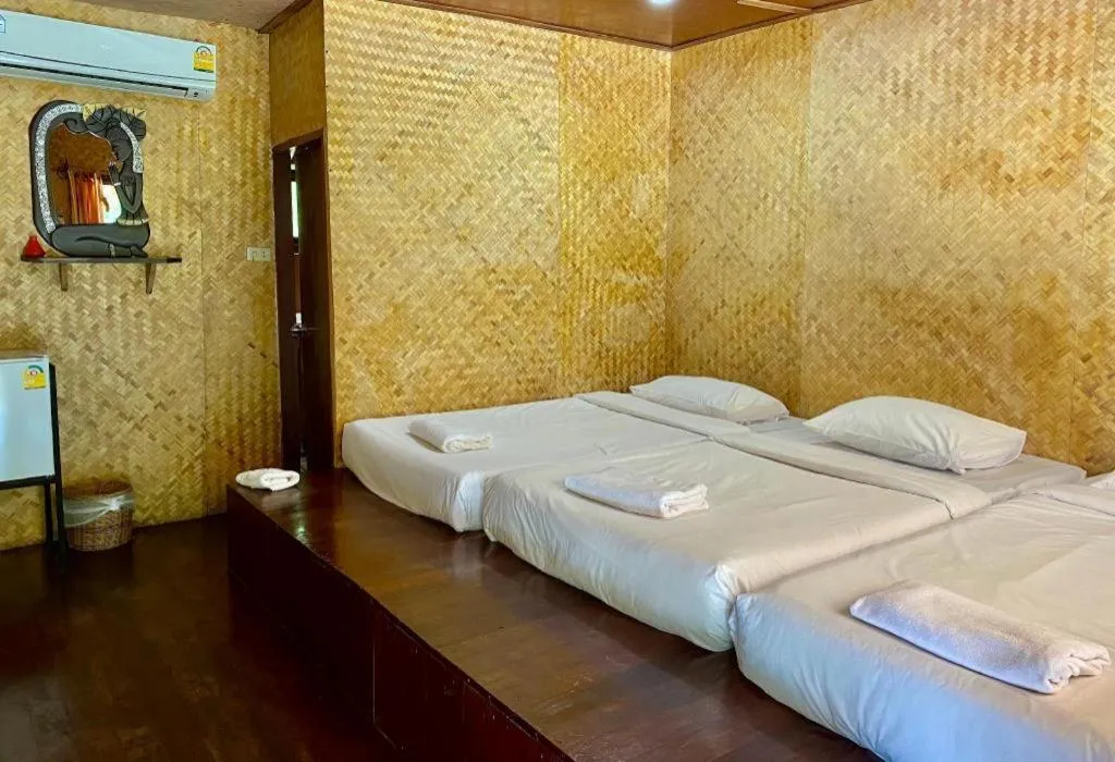 Bed in Tayan Resort Kanchanaburi