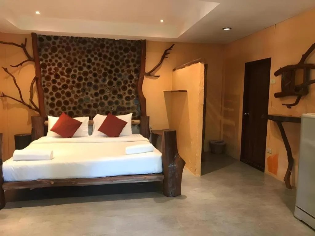 Bed in Tayan Resort Kanchanaburi