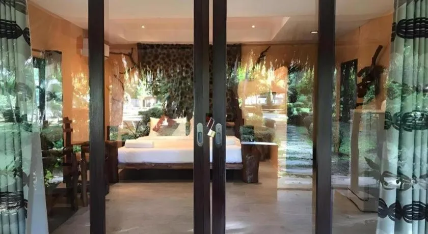 Bed in Tayan Resort Kanchanaburi