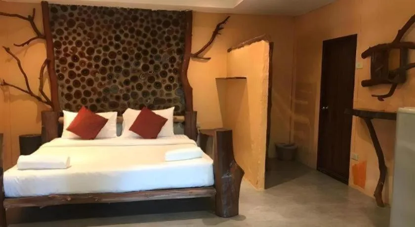 Bed in Tayan Resort Kanchanaburi