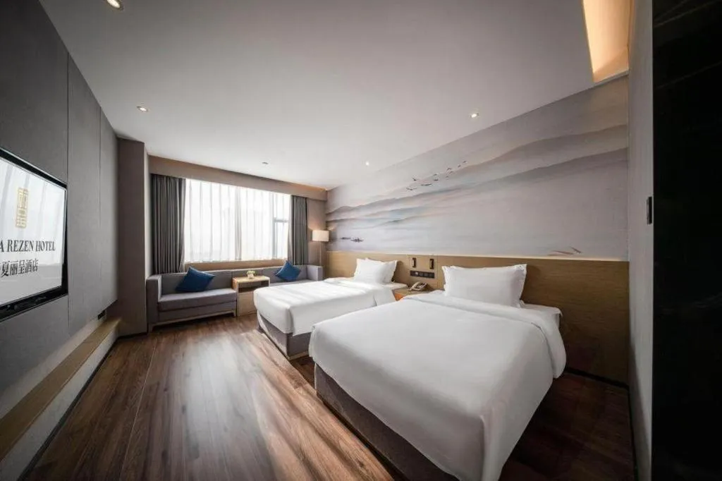 Bed in Rezen Hotel Huaxia Xiamen