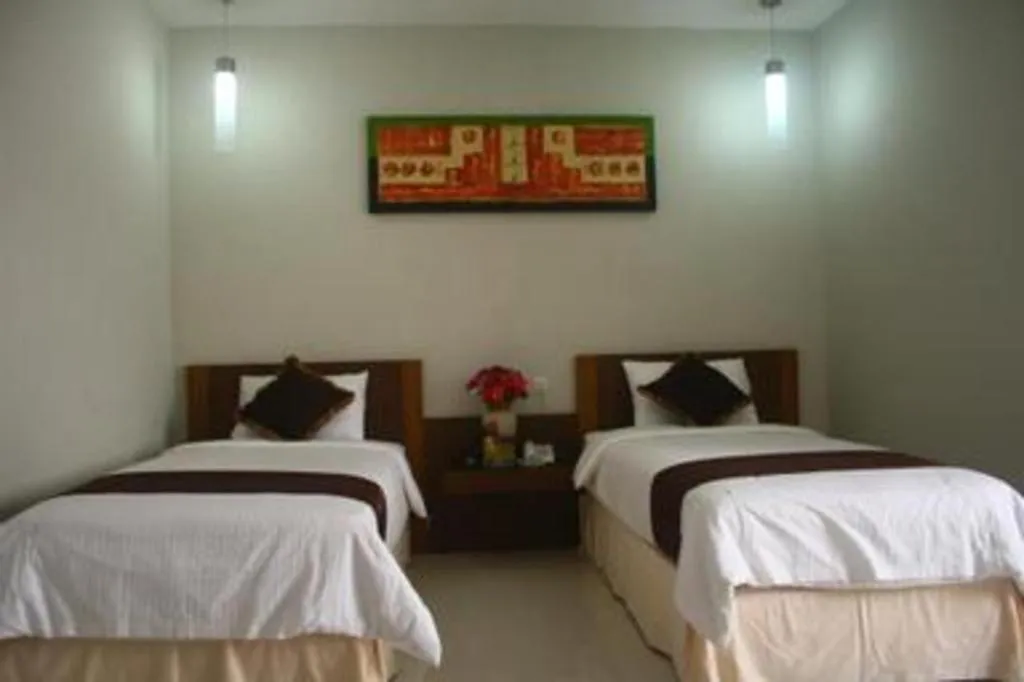 Bed in Mataram Square Hotel
