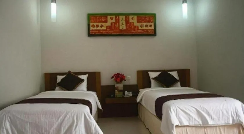 Bed in Mataram Square Hotel