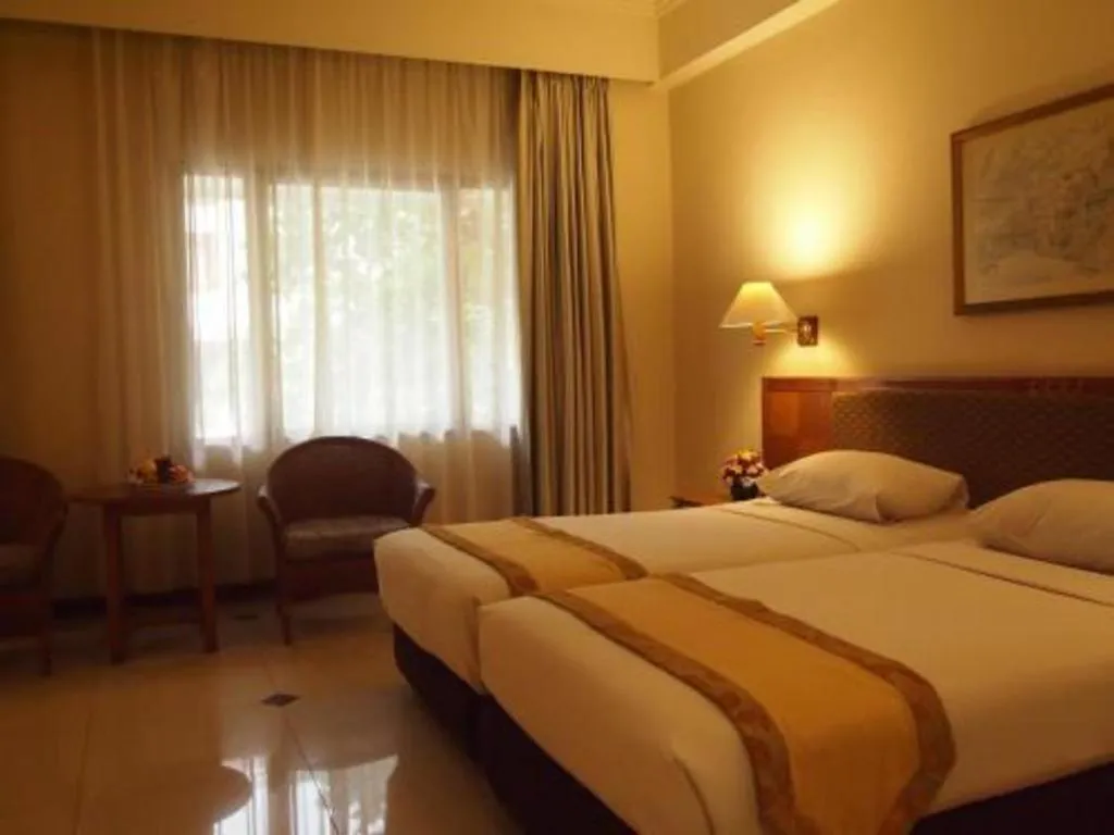 Bed in Bumi Wiyata Hotel