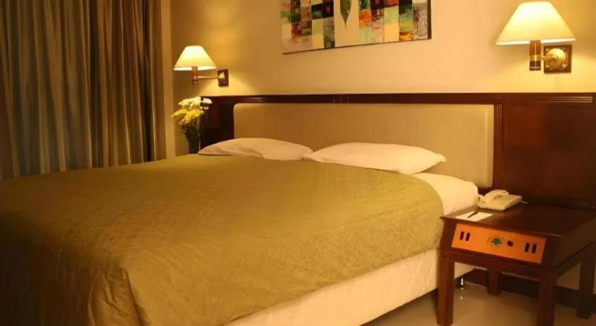 Bed in Bumi Wiyata Hotel