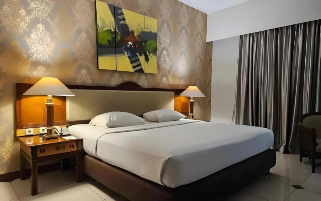 Bed in Bumi Wiyata Hotel