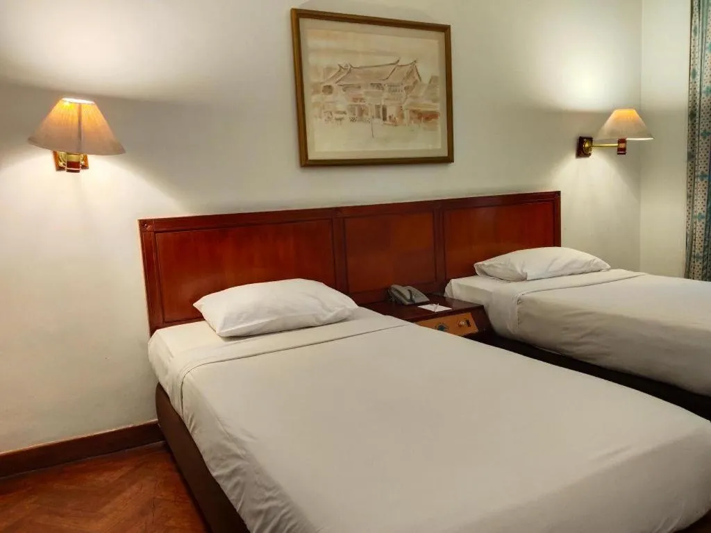 Bed in Bumi Wiyata Hotel