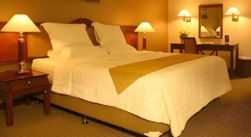 Bed in Bumi Wiyata Hotel