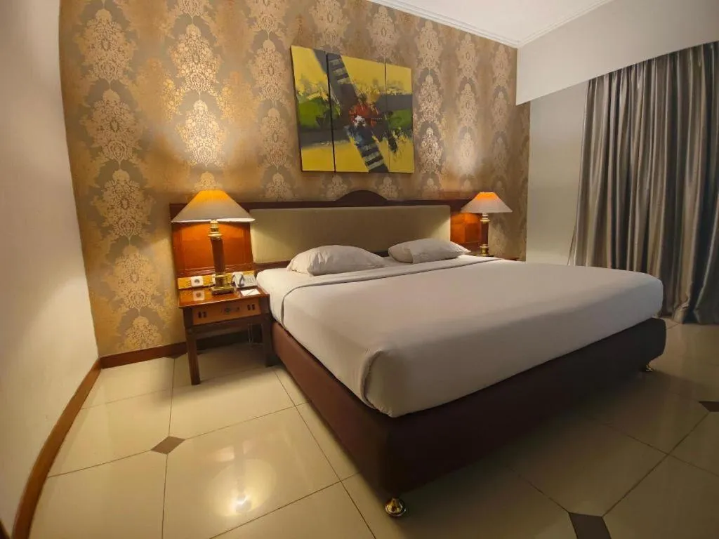 Bed in Bumi Wiyata Hotel