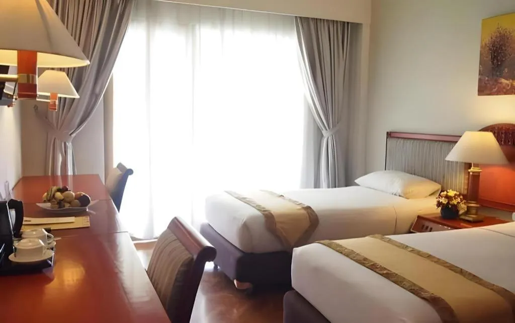 Bed in Bumi Wiyata Hotel