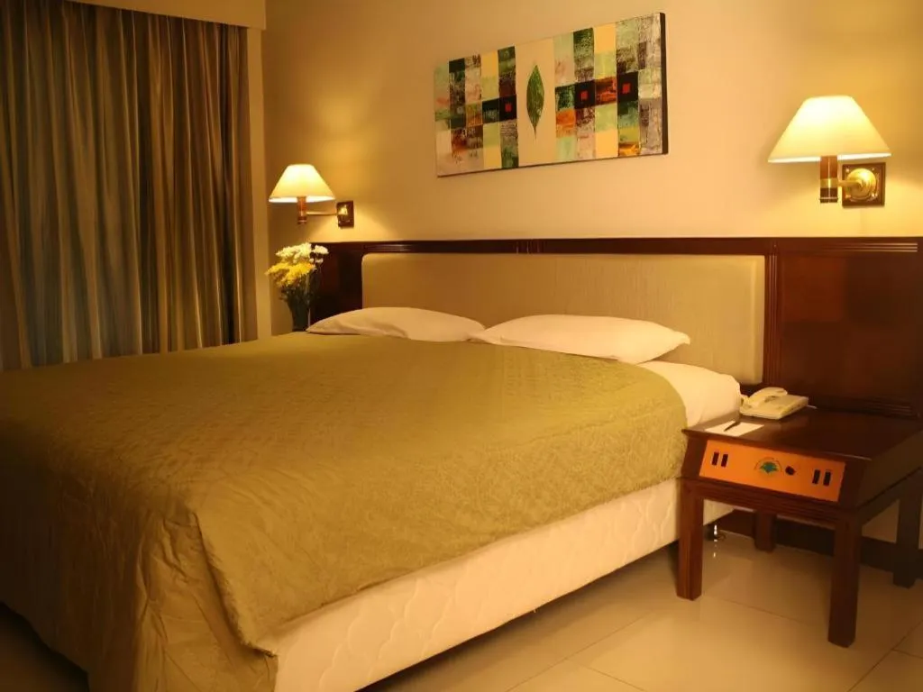 Bed in Bumi Wiyata Hotel