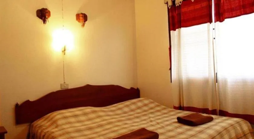 Bed in Panorama Hotel