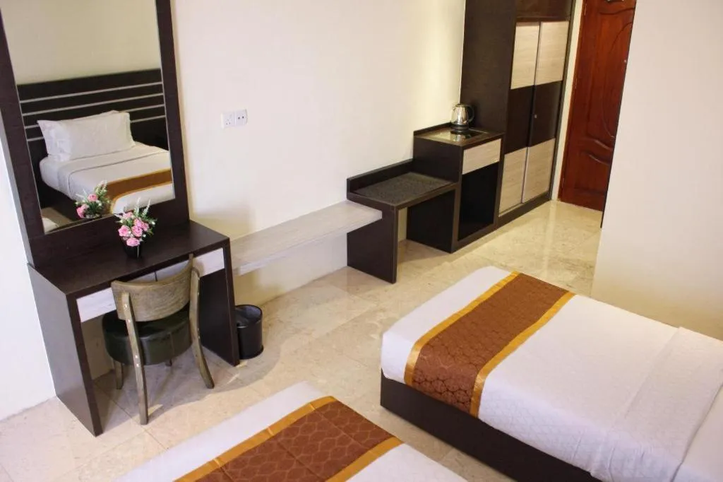 Bed in Nipah Island Resort