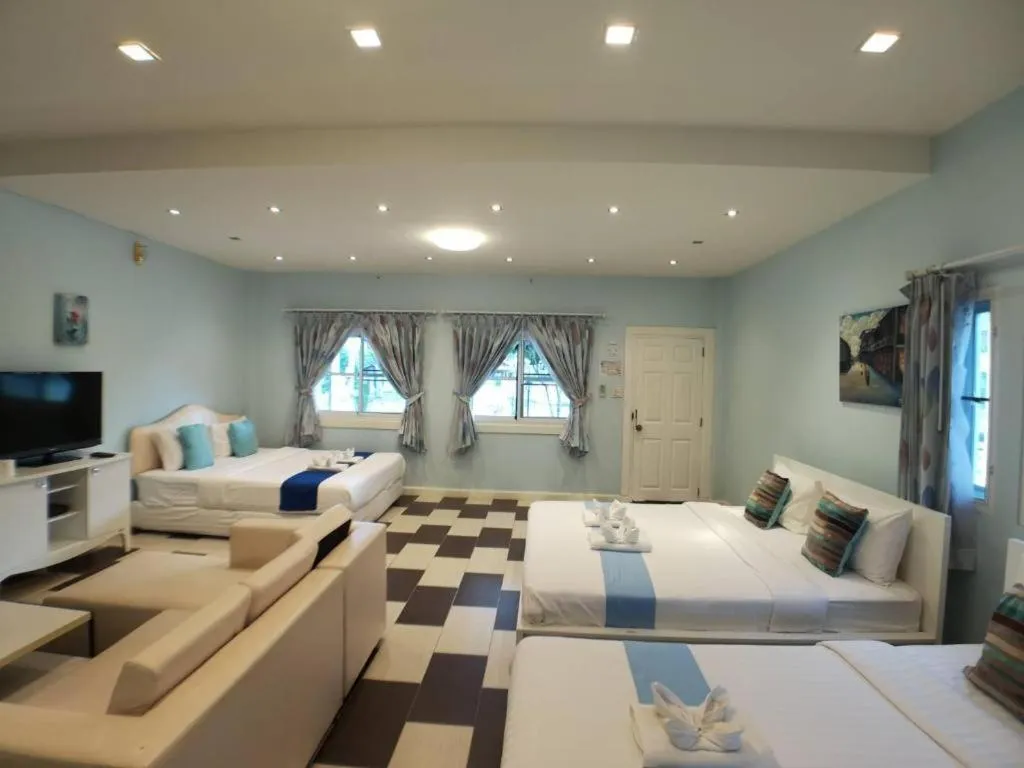 Bed in Chiangkhan Gallery Resort