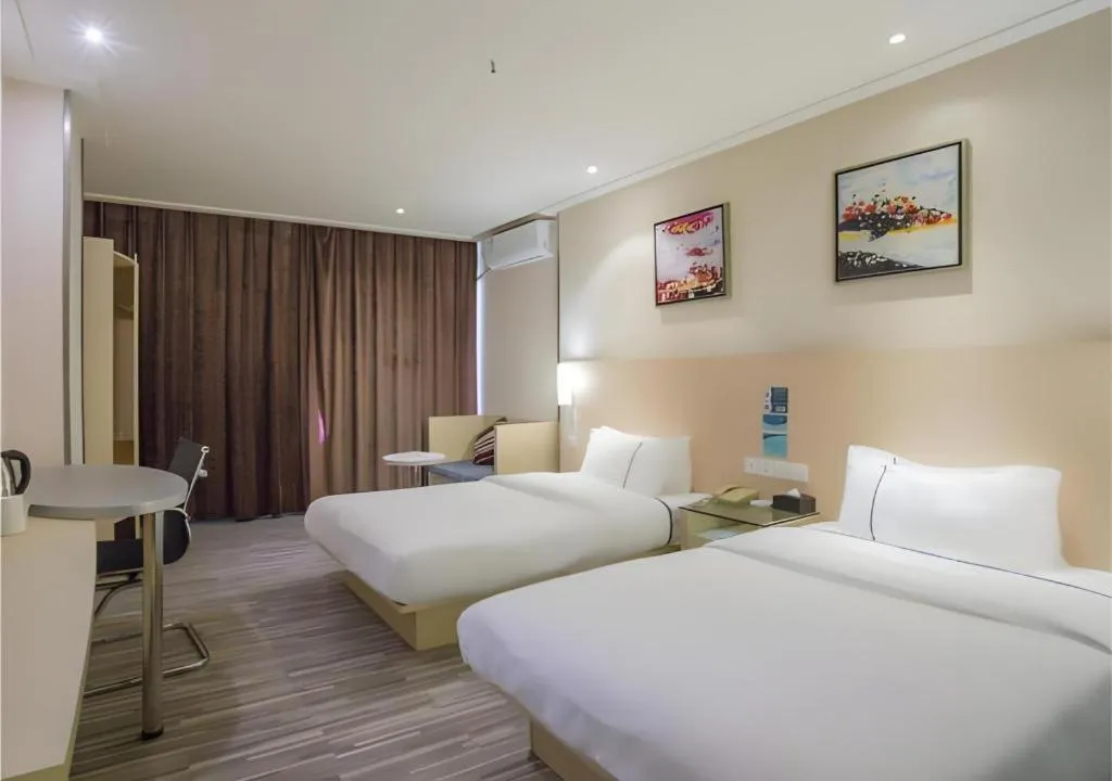 Bed in City Comfort Inn Dongxing National Trade Port