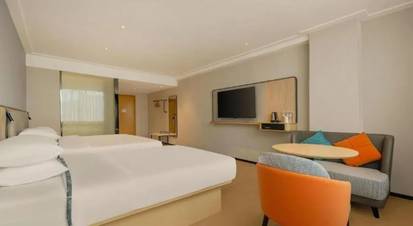 Bed in City Comfort Inn Dongxing National Trade Port