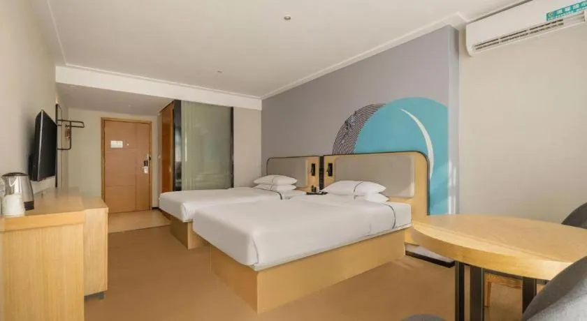 Bed in City Comfort Inn Dongxing National Trade Port