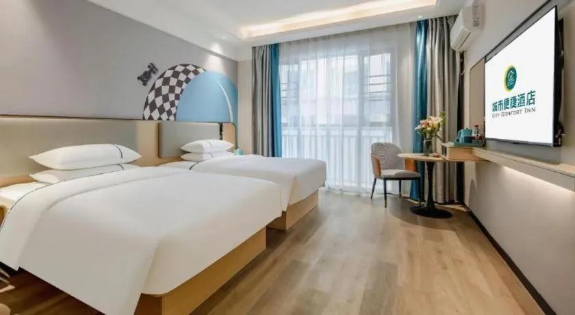 Bed in City Comfort Inn Dongxing National Trade Port