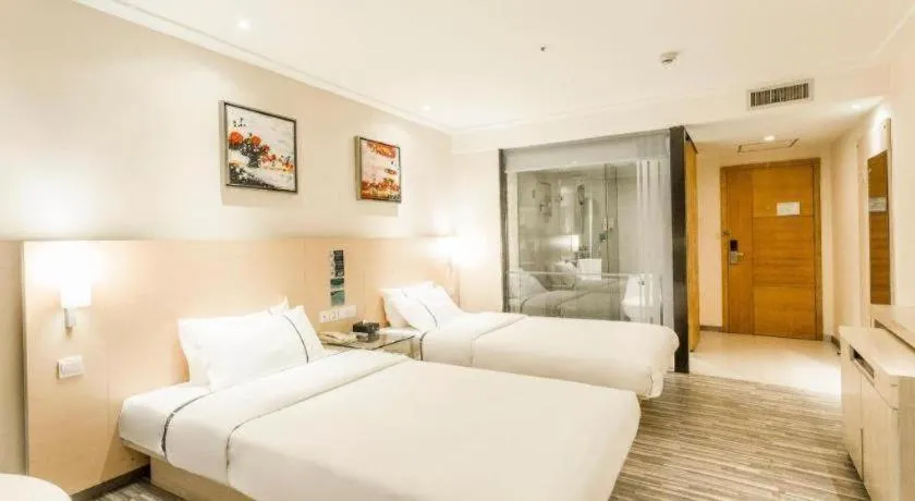 Bed in City Comfort Inn Dongxing National Trade Port