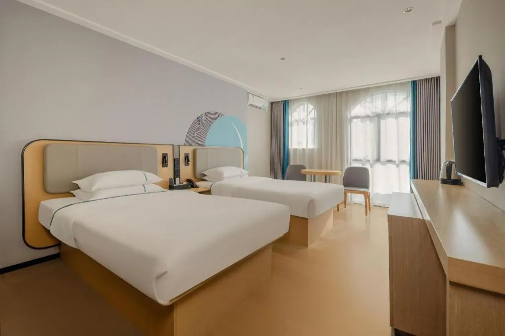 Bed in City Comfort Inn Dongxing National Trade Port