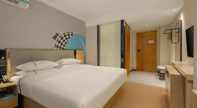 Bed in City Comfort Inn Dongxing National Trade Port