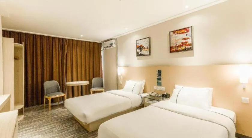 Bed in City Comfort Inn Dongxing National Trade Port