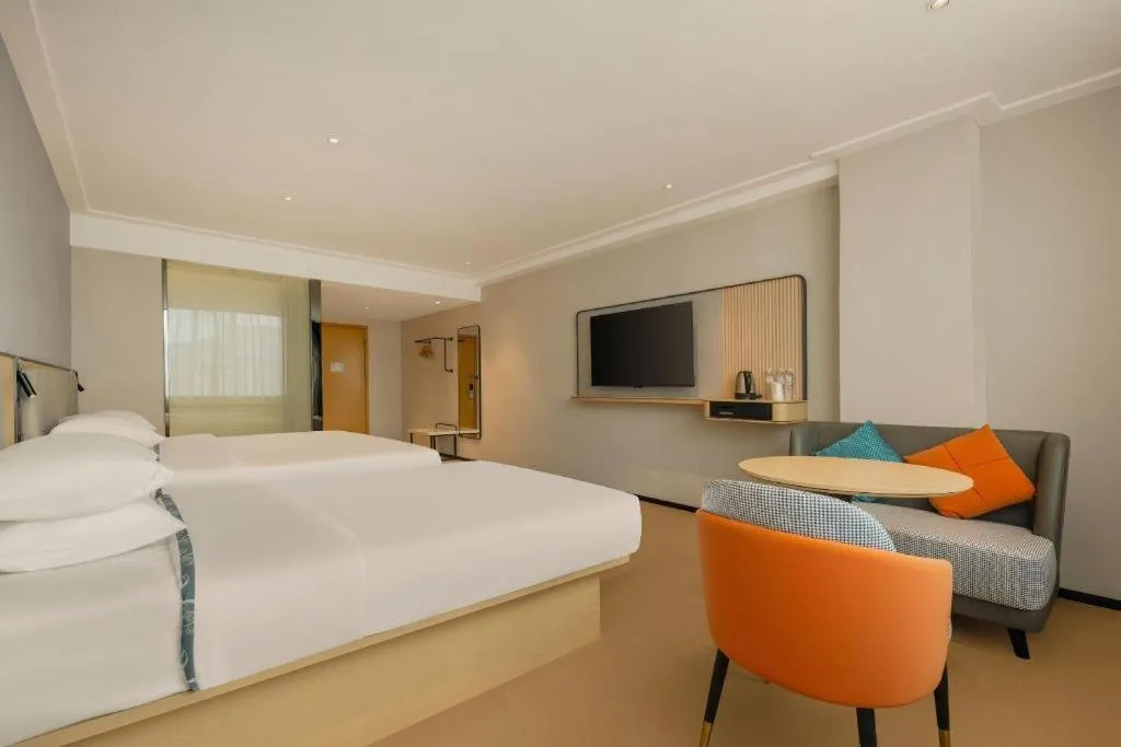Bed in City Comfort Inn Dongxing National Trade Port