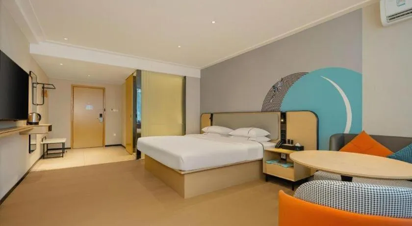 Bed in City Comfort Inn Dongxing National Trade Port