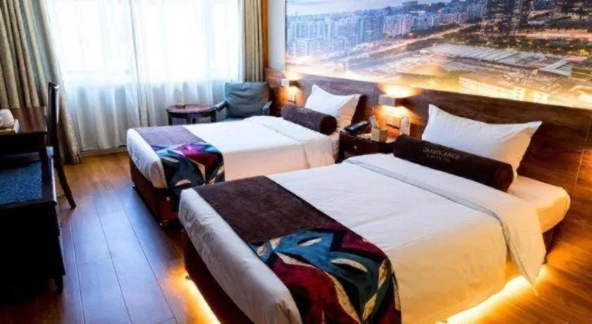 Bed in James Joyce Coffetel Qinhuangdao Taiyangcheng Wenhua Road