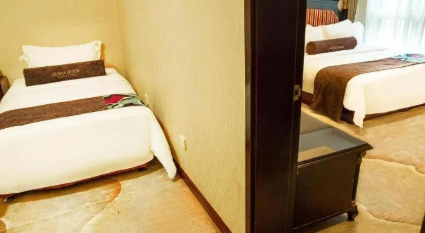 Bed in James Joyce Coffetel Qinhuangdao Taiyangcheng Wenhua Road