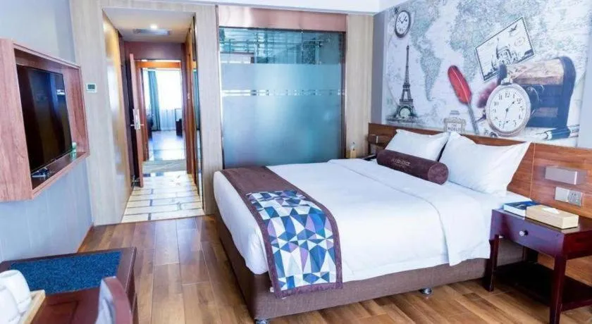 Bed in James Joyce Coffetel Qinhuangdao Taiyangcheng Wenhua Road