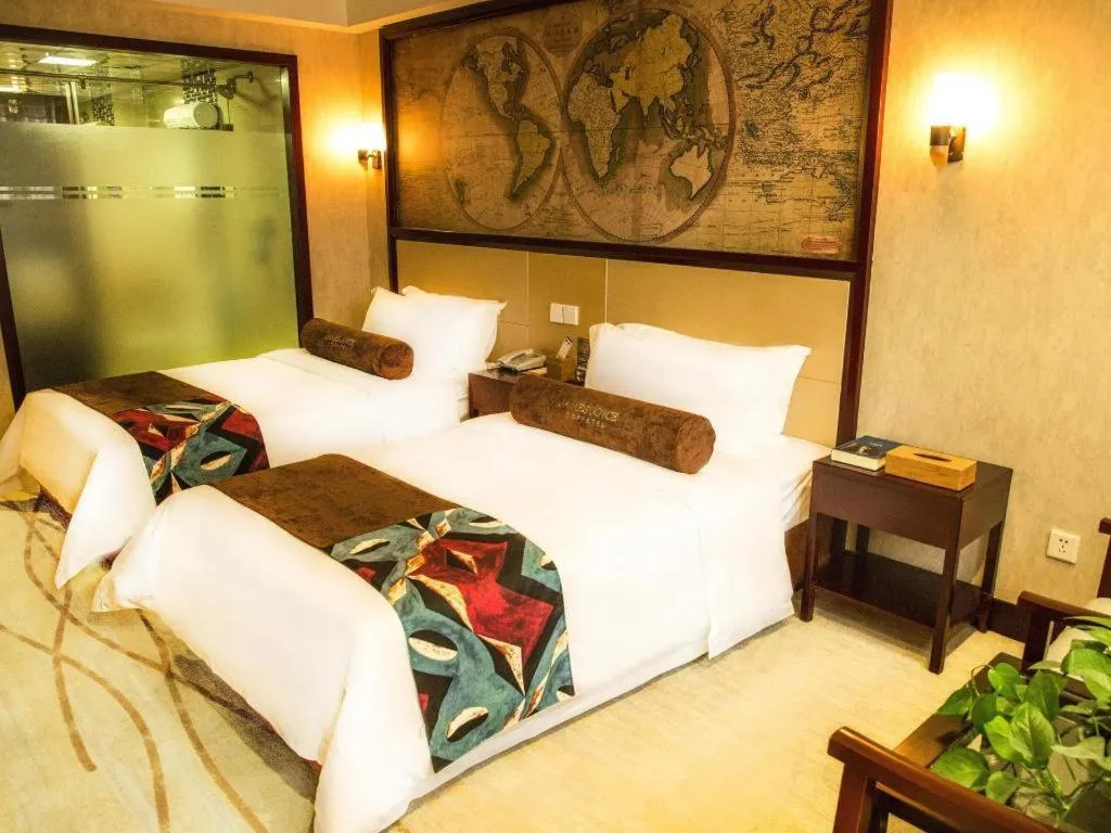 Bed in James Joyce Coffetel Qinhuangdao Taiyangcheng Wenhua Road