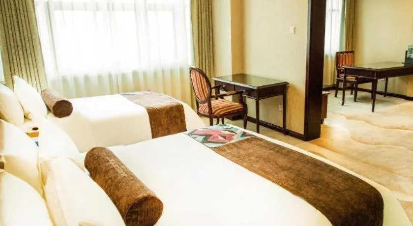 Bed in James Joyce Coffetel Qinhuangdao Taiyangcheng Wenhua Road