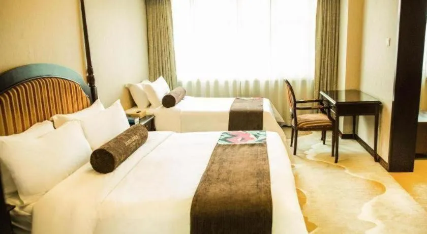 Bed in James Joyce Coffetel Qinhuangdao Taiyangcheng Wenhua Road