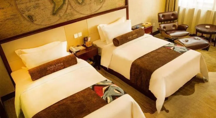 Bed in James Joyce Coffetel Qinhuangdao Taiyangcheng Wenhua Road