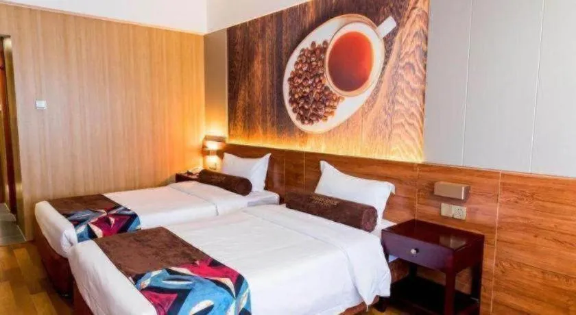 Bed in James Joyce Coffetel Qinhuangdao Taiyangcheng Wenhua Road