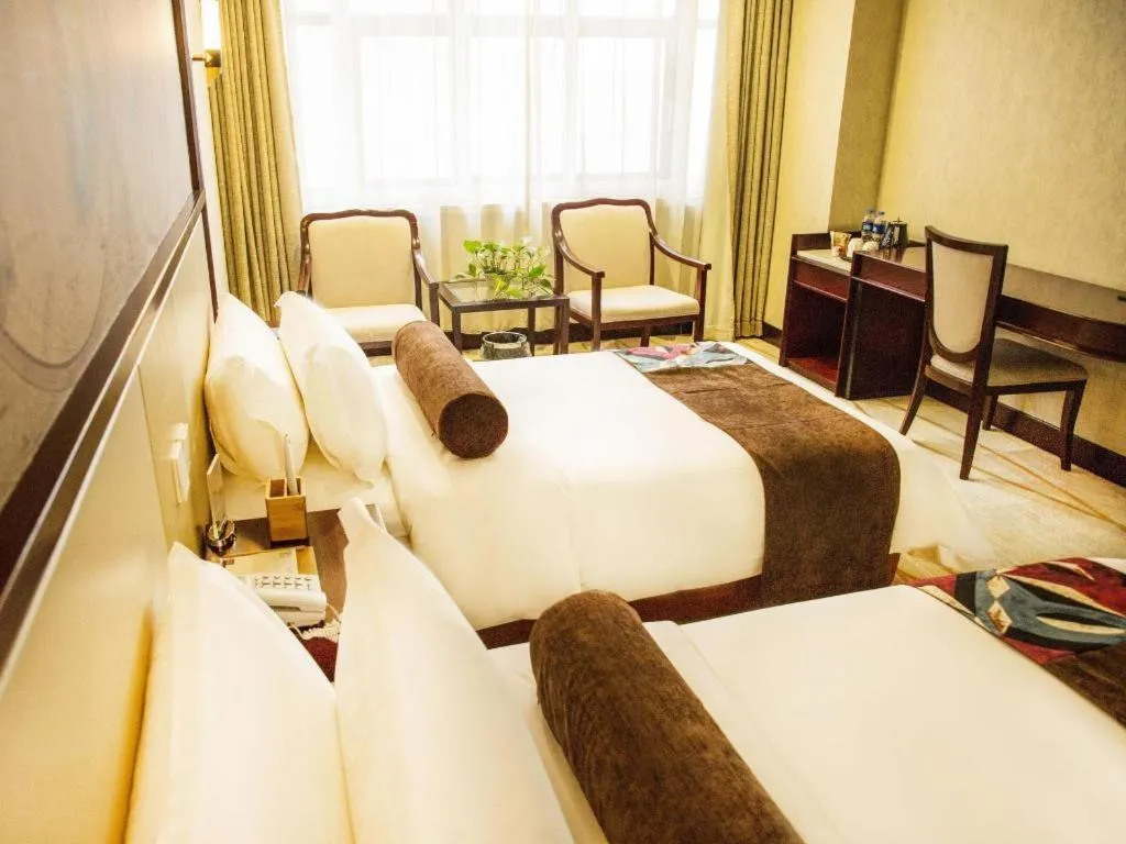 Bed in James Joyce Coffetel Qinhuangdao Taiyangcheng Wenhua Road