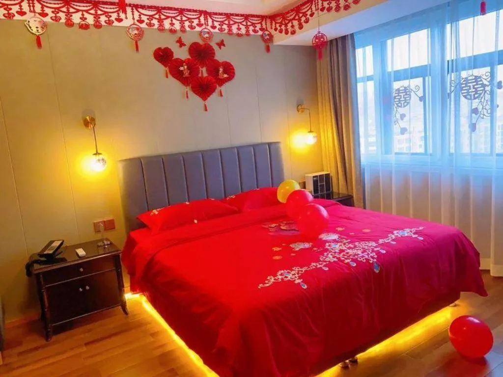 Bed in James Joyce Coffetel Qinhuangdao Taiyangcheng Wenhua Road