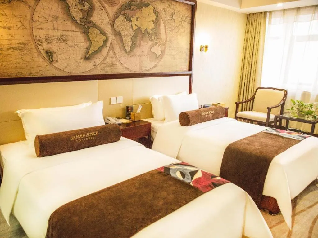 Bed in James Joyce Coffetel Qinhuangdao Taiyangcheng Wenhua Road