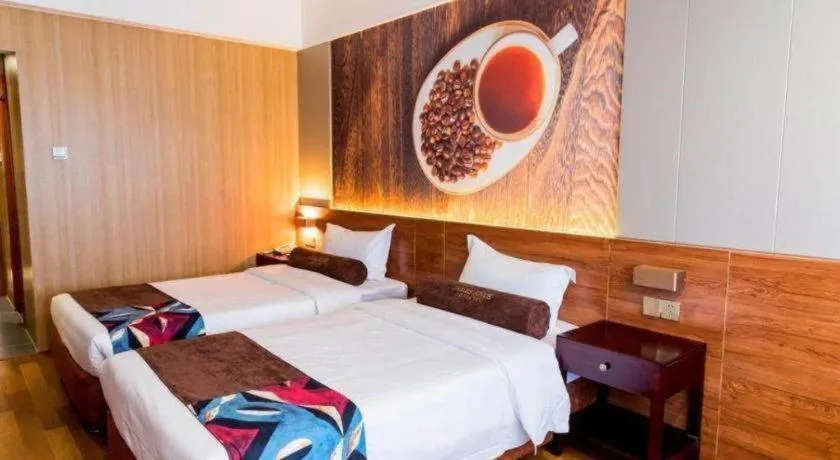 Bed in James Joyce Coffetel Qinhuangdao Taiyangcheng Wenhua Road