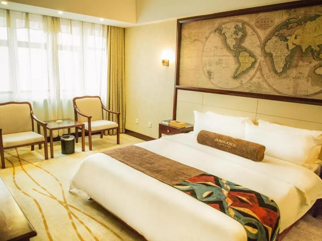 Bed in James Joyce Coffetel Qinhuangdao Taiyangcheng Wenhua Road