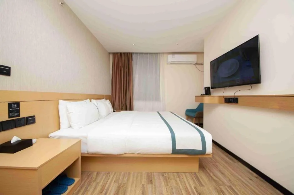 Bed in City Comfort Inn Yulin Wenhua Square Wanda Plaza