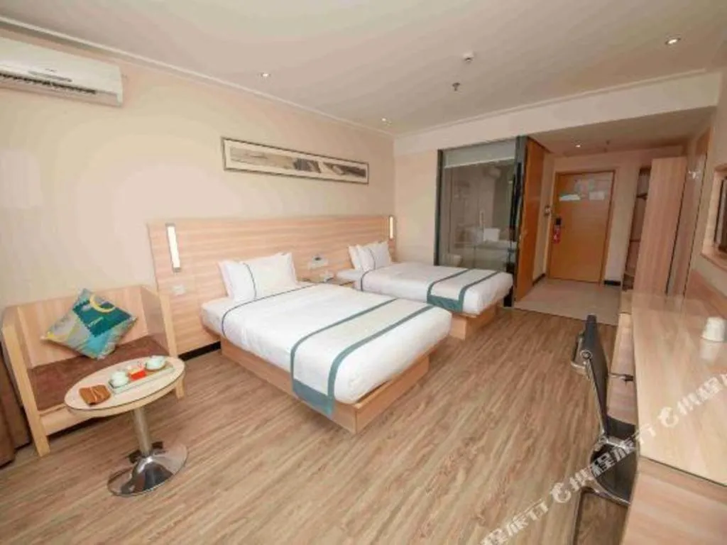 Bed in City Comfort Inn Yulin Wenhua Square Wanda Plaza