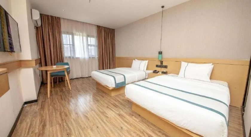 Bed in City Comfort Inn Yulin Wenhua Square Wanda Plaza