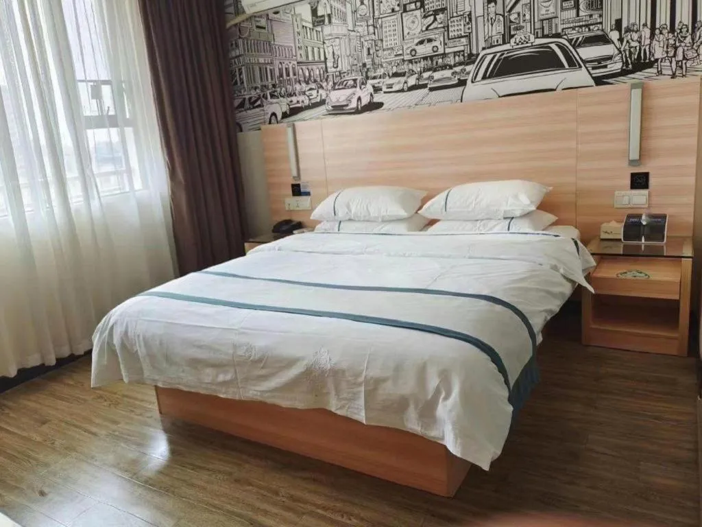 Bed in City Comfort Inn Yulin Wenhua Square Wanda Plaza