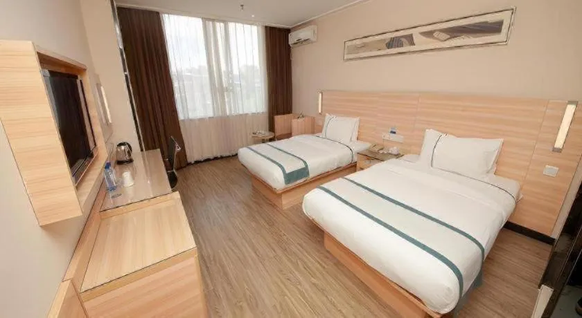 Bed in City Comfort Inn Yulin Wenhua Square Wanda Plaza