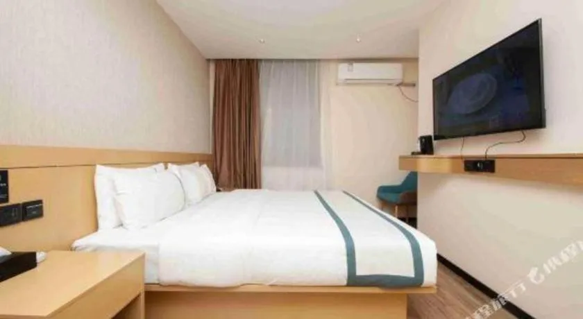 Bed in City Comfort Inn Yulin Wenhua Square Wanda Plaza