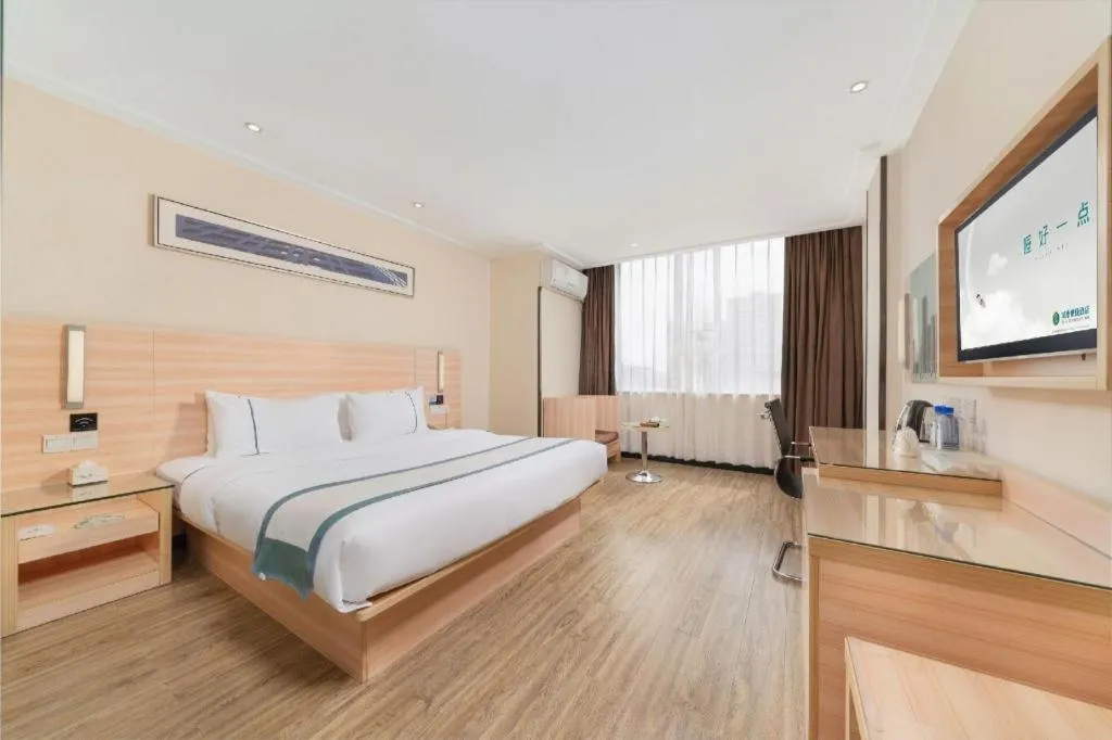 Bed in City Comfort Inn Yulin Wenhua Square Wanda Plaza