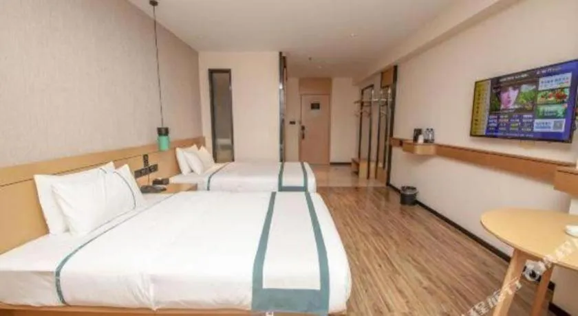 Bed in City Comfort Inn Yulin Wenhua Square Wanda Plaza